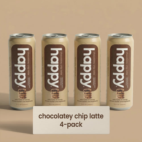 Four cans of 'happy' chocolate chip Latte on a beige background