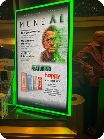 A sign showing McNeal and Happy Coffee